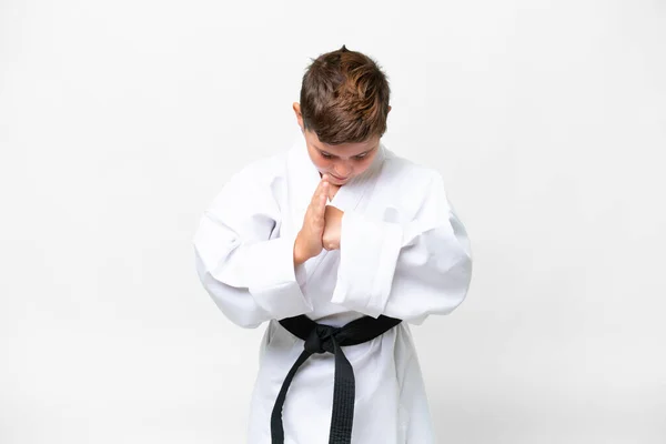 Pequeño Niño Caucásico Sobre Fondo Blanco Aislado Haciendo Karate Saludando —  Fotos de Stock