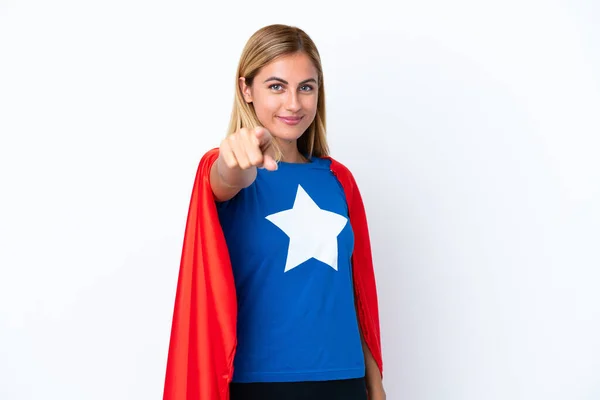 Super Hero caucasian woman isolated background points finger at you with a confident expression