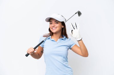Young caucasian woman playing golf isolated on white background showing ok sign with fingers