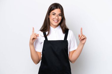 Restaurant Brazilian waiter woman isolated on white background pointing up a great idea