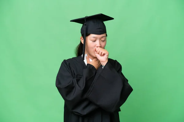 Young university graduate Asian woman over isolated background is suffering with cough and feeling bad