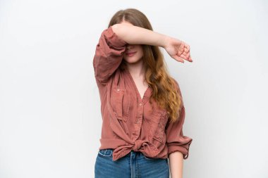 Young pretty woman isolated on white background covering eyes by hands
