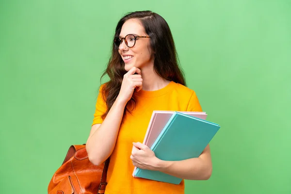 Young Student Caucasian Woman Isolated Background Looking Side Smiling — Photo