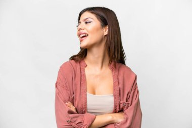 Genç Rus kadın soyutlanmış beyaz arka plan mutlu ve gülümsüyor.