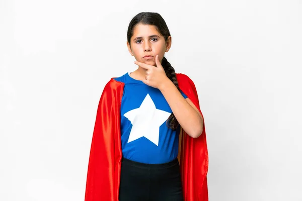 Super Hero girl over isolated white background thinking