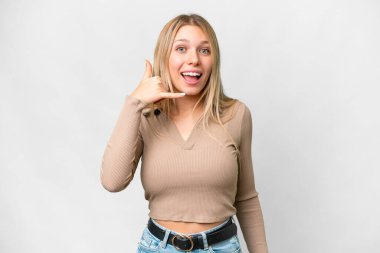 Young pretty blonde woman over isolated white background making phone gesture. Call me back sign