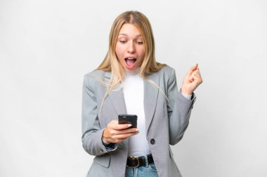 Young pretty blonde woman over isolated white background surprised and sending a message