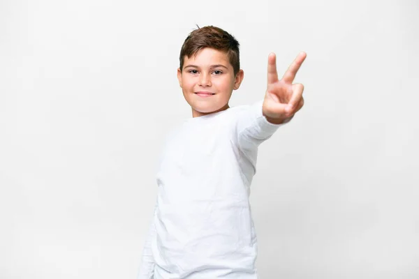 Petit Enfant Caucasien Sur Fond Blanc Isolé Souriant Montrant Signe — Photo