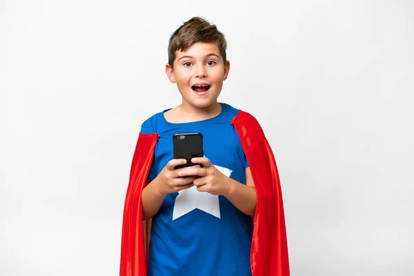 Super Hero Caucasian Kid Isolated White Background Surprised Sending Message — Stock Photo, Image