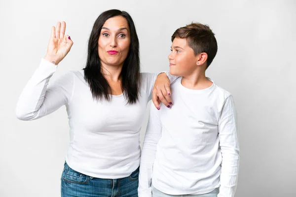 Little Caucasian Kid His Mother Isolated White Background Showing Sign — Stock Photo, Image
