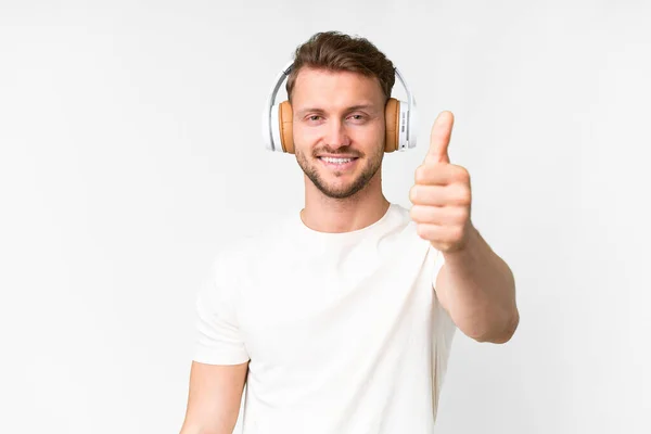 Young Handsome Caucasian Man Isolated White Background Listening Music Thumb — Stock Photo, Image