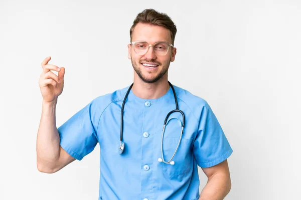 Young Nurse Man Isolated White Background Making Guitar Gesture — Stock Photo, Image