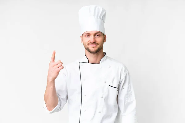Jovem Chef Caucasiano Sobre Fundo Branco Isolado Apontando Com Dedo — Fotografia de Stock