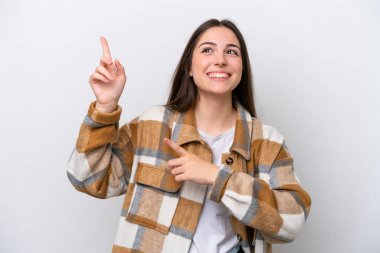 Young girl isolated on white background pointing with the index finger a great idea