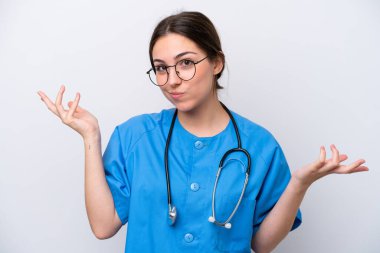 surgeon doctor woman holding tools isolated on white background having doubts while raising hands