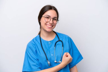 surgeon doctor woman holding tools isolated on white background celebrating a victory