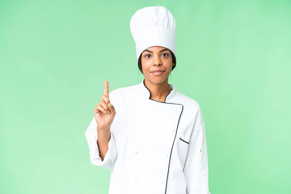 아프리카 미국인 요리사가 지식으로 손가락을 가리키는 생각입니다 — 스톡 사진