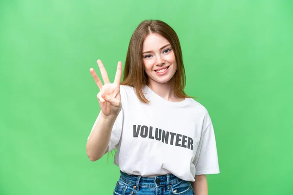 Joven Voluntaria Mujer Sobre Aislado Croma Clave Fondo Feliz Contar — Foto de Stock