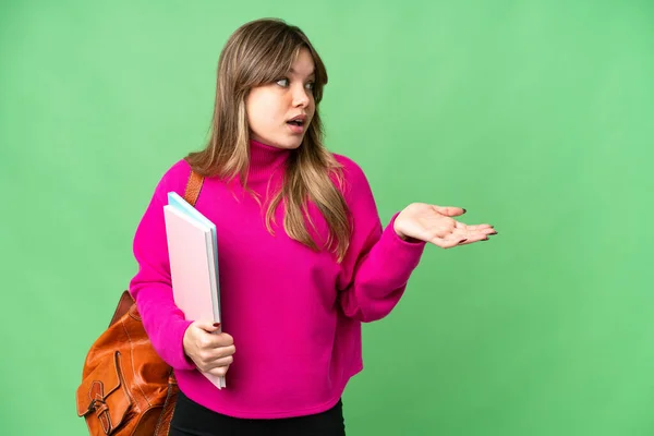 Young Student Girl Isolated Chroma Key Background Surprise Expression While — Stock Photo, Image
