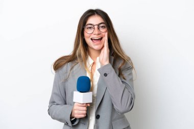 Young caucasian TV presenter woman isolated on white background shouting with mouth wide open