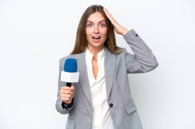 Young TV presenter caucasian woman isolated on white background with surprise expression