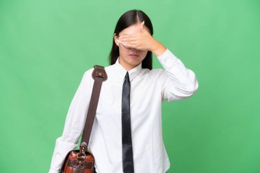 Young Asian business woman over isolated background covering eyes by hands. Do not want to see something