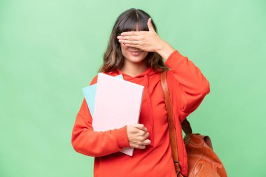 Young student caucasian woman over isolated background covering eyes by hands. Do not want to see something