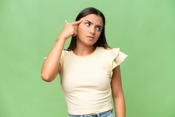 Young Caucasian Woman Isolated Green Chroma Background Making Gesture Madness — Stockfoto