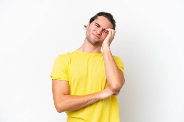 Caucasian handsome man isolated on white background with headache