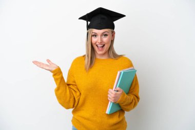 Young student caucasian woman isolated on white background with shocked facial expression