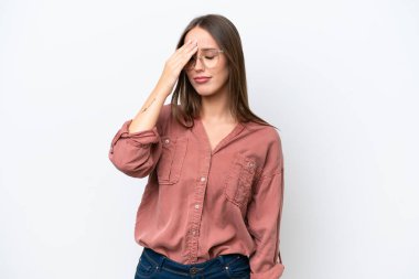 Young pretty caucasian woman isolated on white background with headache