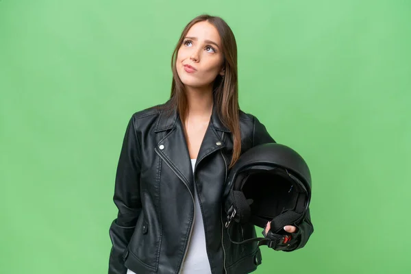 Young Pretty Caucasian Woman Motorcycle Helmet Isolated Background Looking —  Fotos de Stock