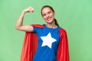 Super Hero caucasian woman over isolated background doing strong gesture