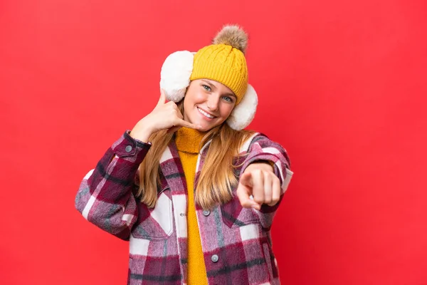Young Beautiful Woman Wearing Winter Muffs Isolated Red Background Making — Stockfoto
