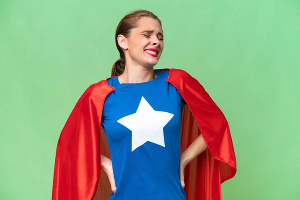 Super Hero caucasian woman over isolated background suffering from backache for having made an effort