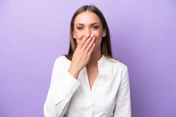 stock image Young caucasian woman isolated on purple background happy and smiling covering mouth with hand