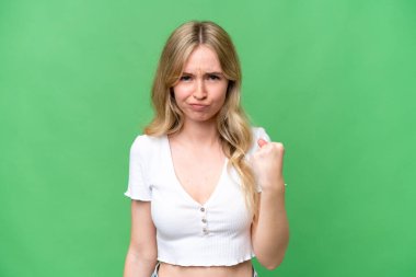 Young English woman over isolated background with unhappy expression