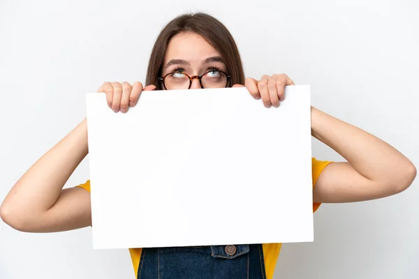 Young Ukrainian Woman Isolated White Background Holding Empty Placard Hiding — Stockfoto