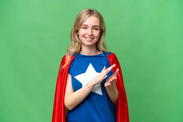 Super Hero English woman over isolated background applauding after presentation in a conference