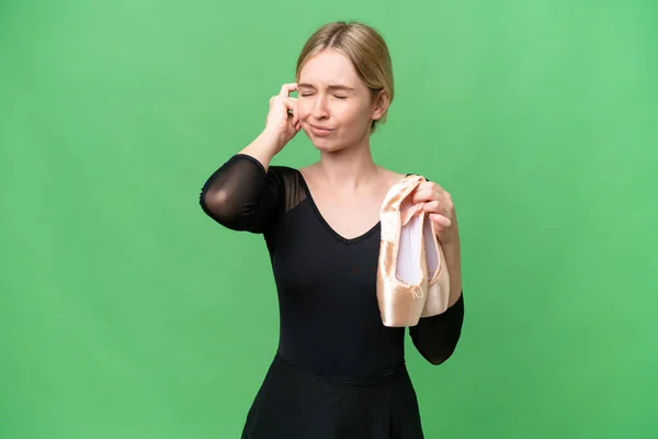 Young English woman practicing ballet over isolated background frustrated and covering ears