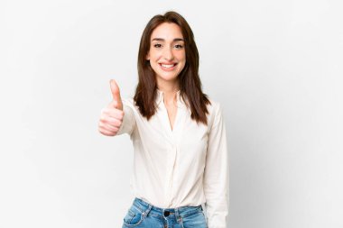 Young caucasian woman over isolated white background with thumbs up because something good has happened