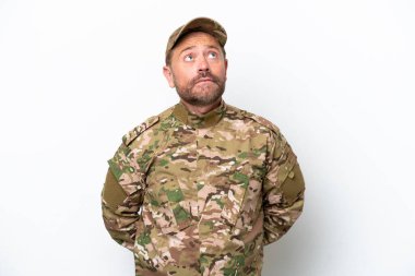 Military man isolated on white background and looking up