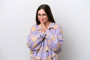 Young girl isolated on white background keeps palm together. Person asks for something