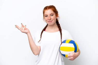 Young caucasian reddish woman playing volleyball isolated on white background extending hands to the side for inviting to come