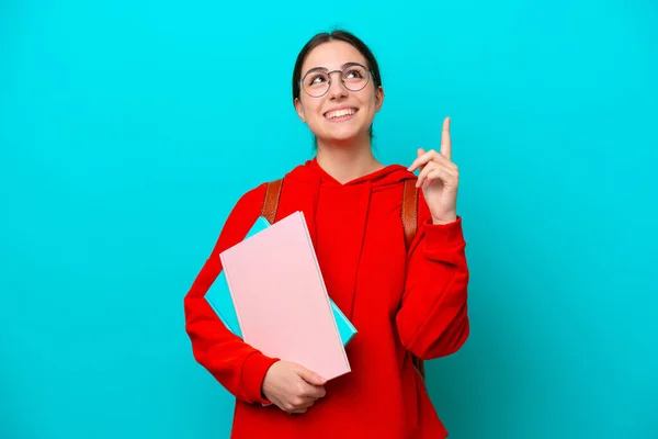 Young Student Caucasian Woman Isolated Blue Background Pointing Great Idea — Fotografia de Stock