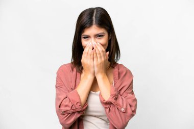 Young Russian woman over isolated white background happy and smiling covering mouth with hands