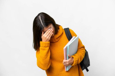 Young student woman over isolated white background with tired and sick expression