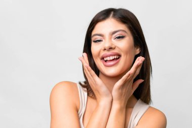 Young Russian woman over isolated white background . Portrait