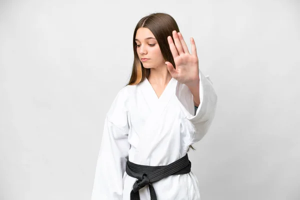 Teenager Girl Doing Karate Isolated White Background Making Stop Gesture — Foto de Stock