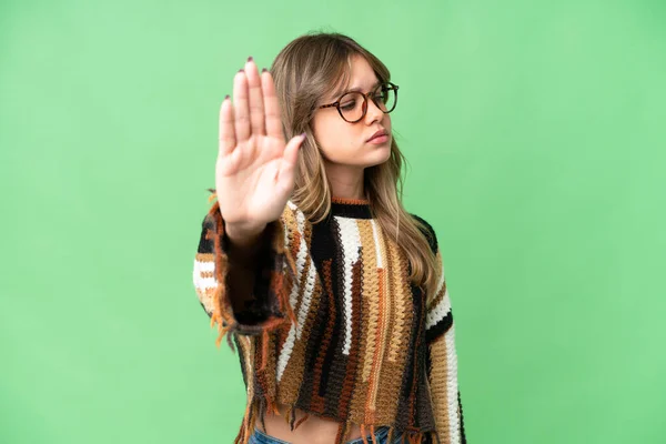 Joven Chica Sobre Aislado Croma Clave Fondo Haciendo Stop Gesture —  Fotos de Stock